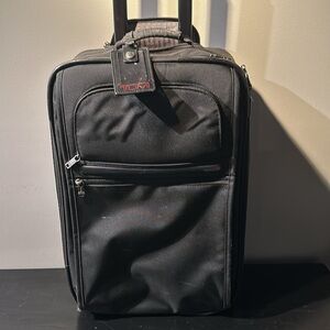 Tumi Carry-on luggage